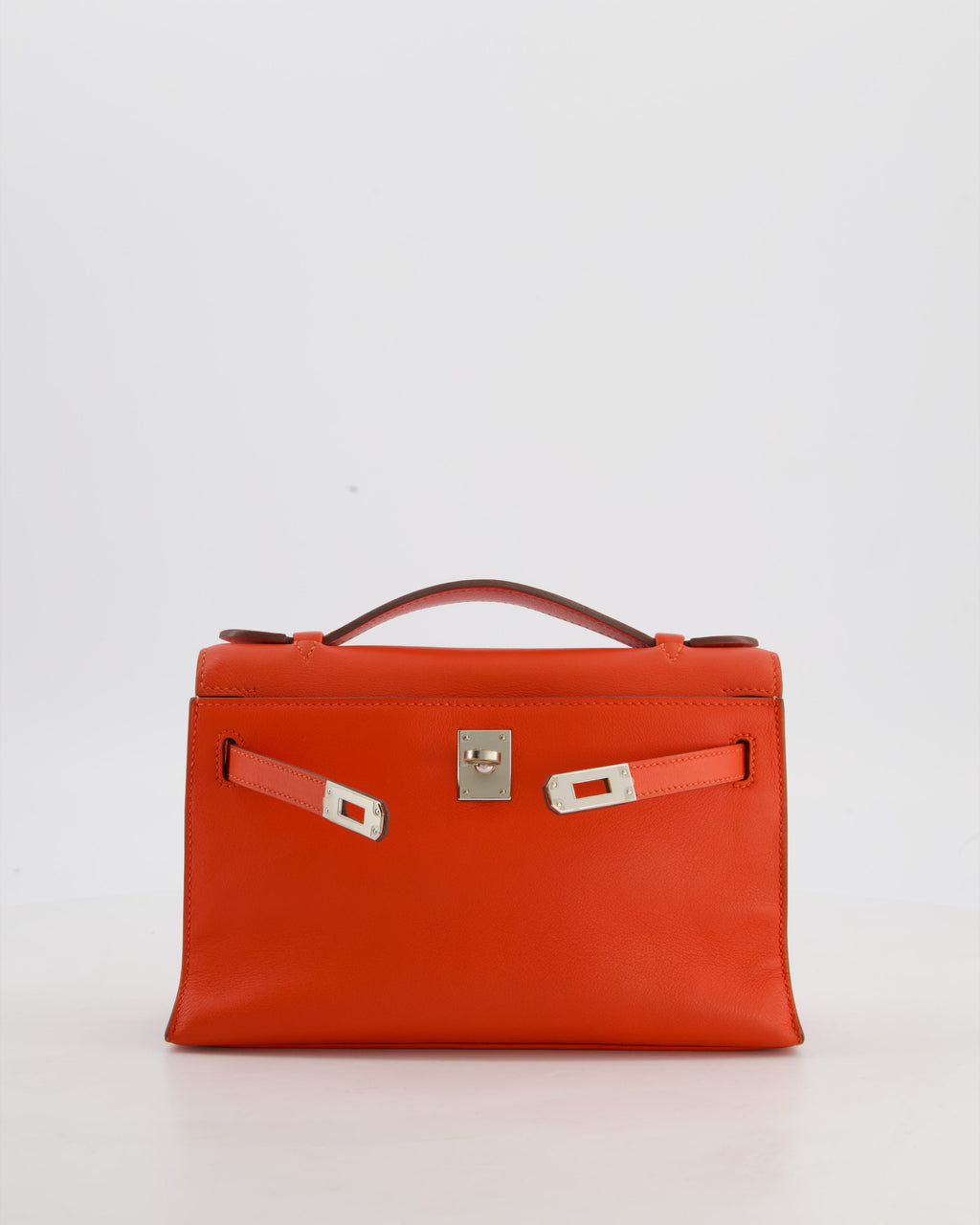Hermès Kelly Pochette Bag in Capucine Swift Leather with Palladium Hardware