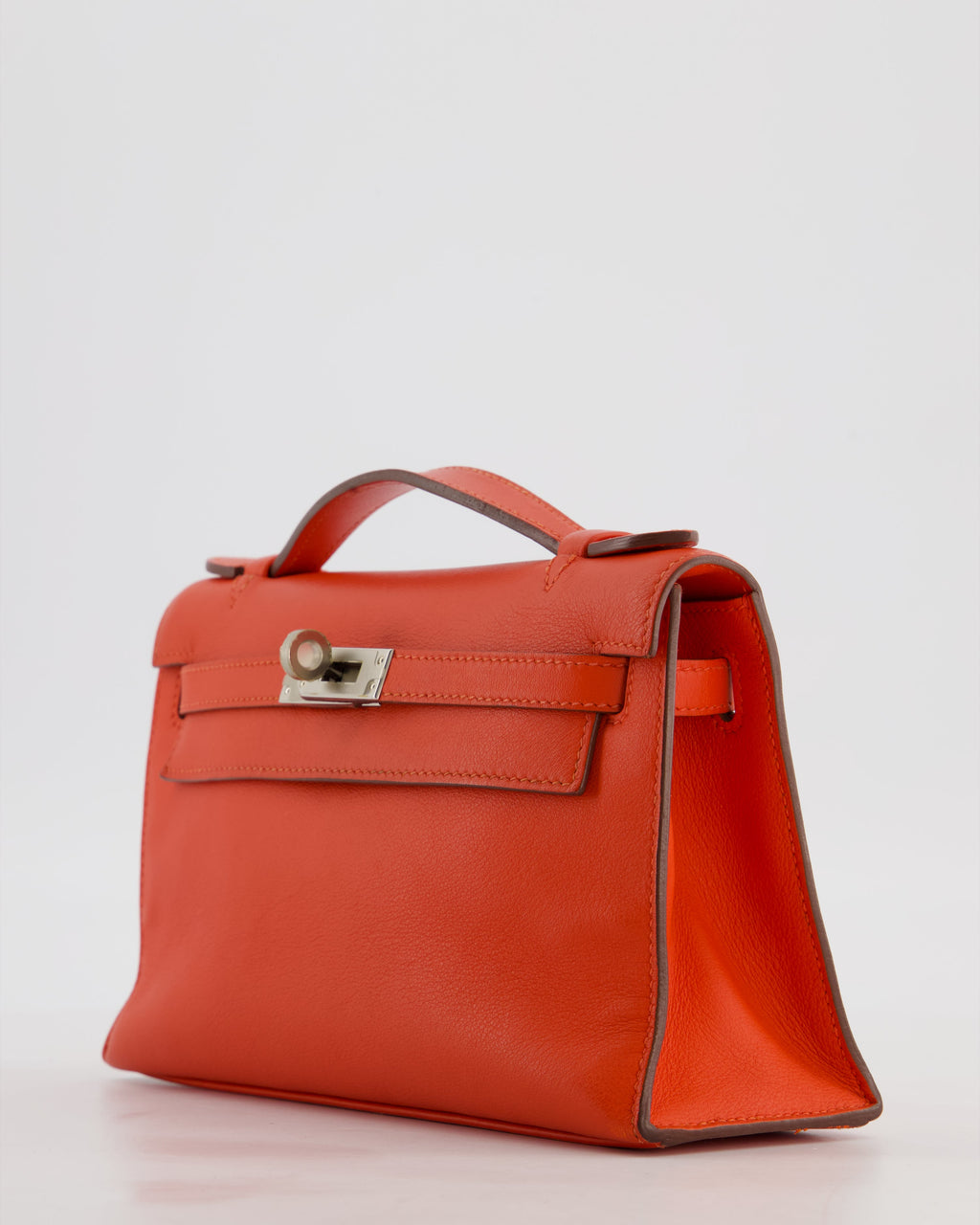 Hermès Kelly Pochette Bag in Capucine Swift Leather with Palladium Hardware
