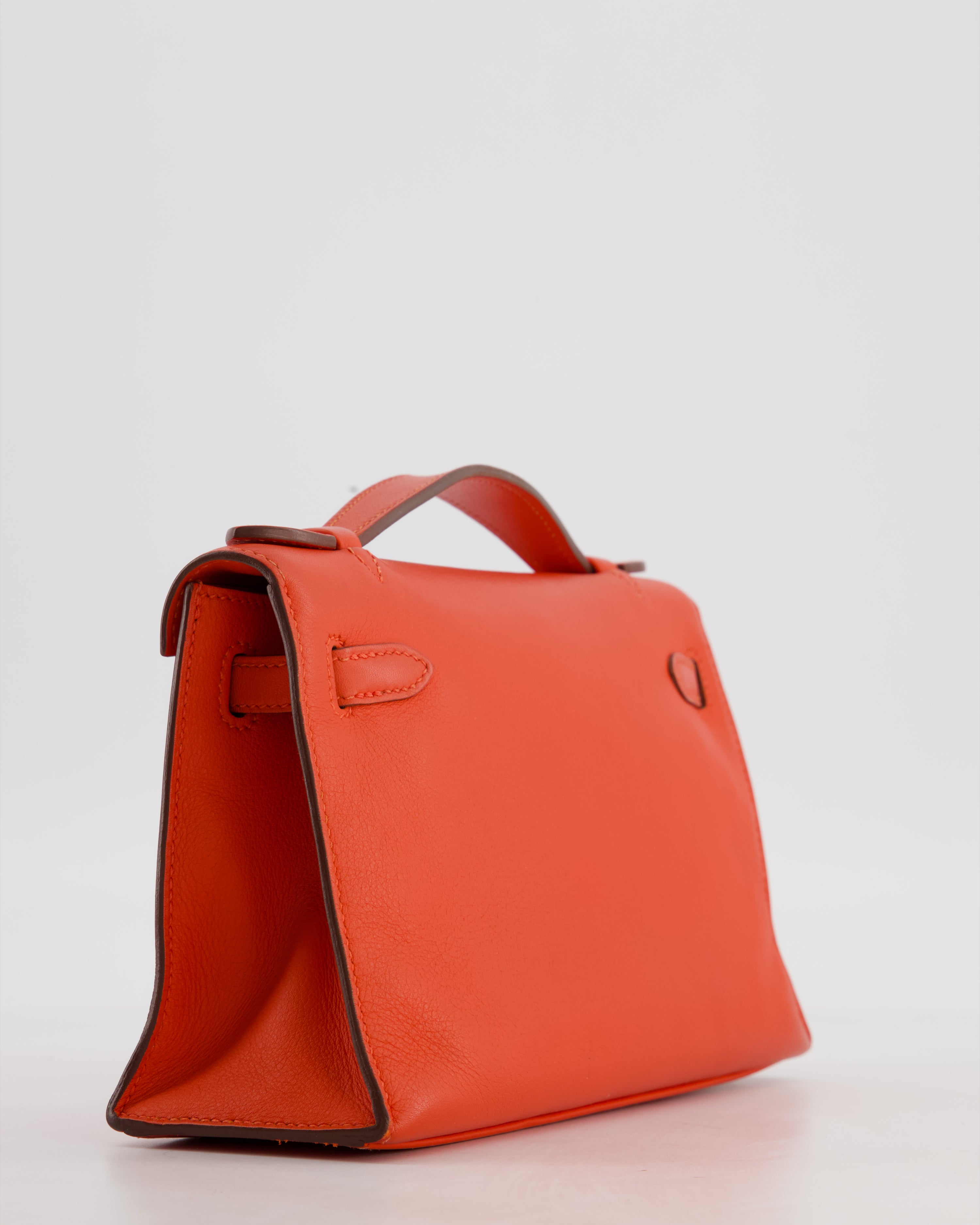 Hermès Kelly Pochette Bag in Capucine Swift Leather with Palladium Hardware