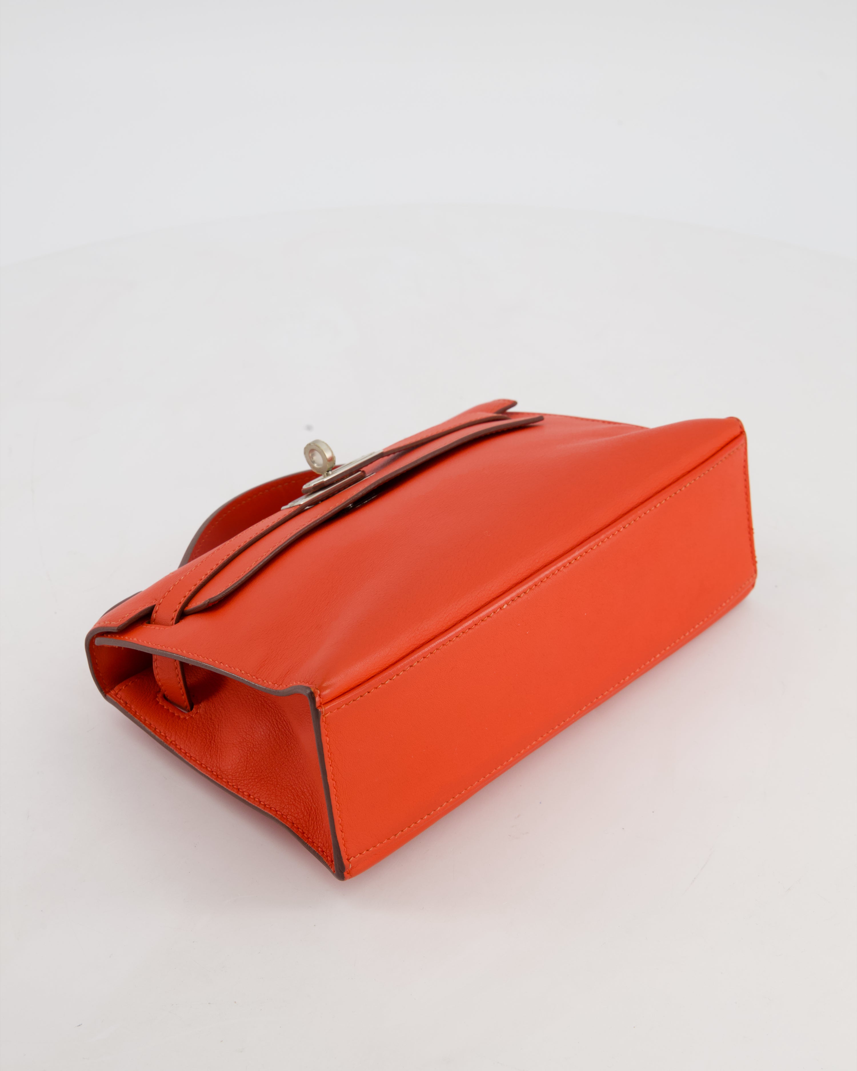 Hermès Kelly Pochette Bag in Capucine Swift Leather with Palladium Hardware