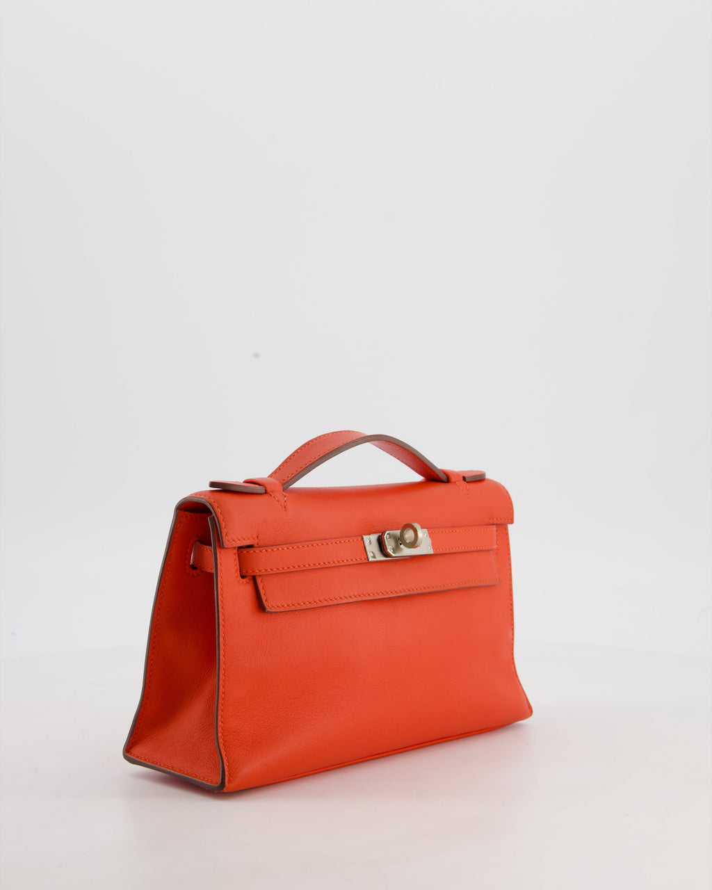 Hermès Kelly Pochette Bag in Capucine Swift Leather with Palladium Hardware