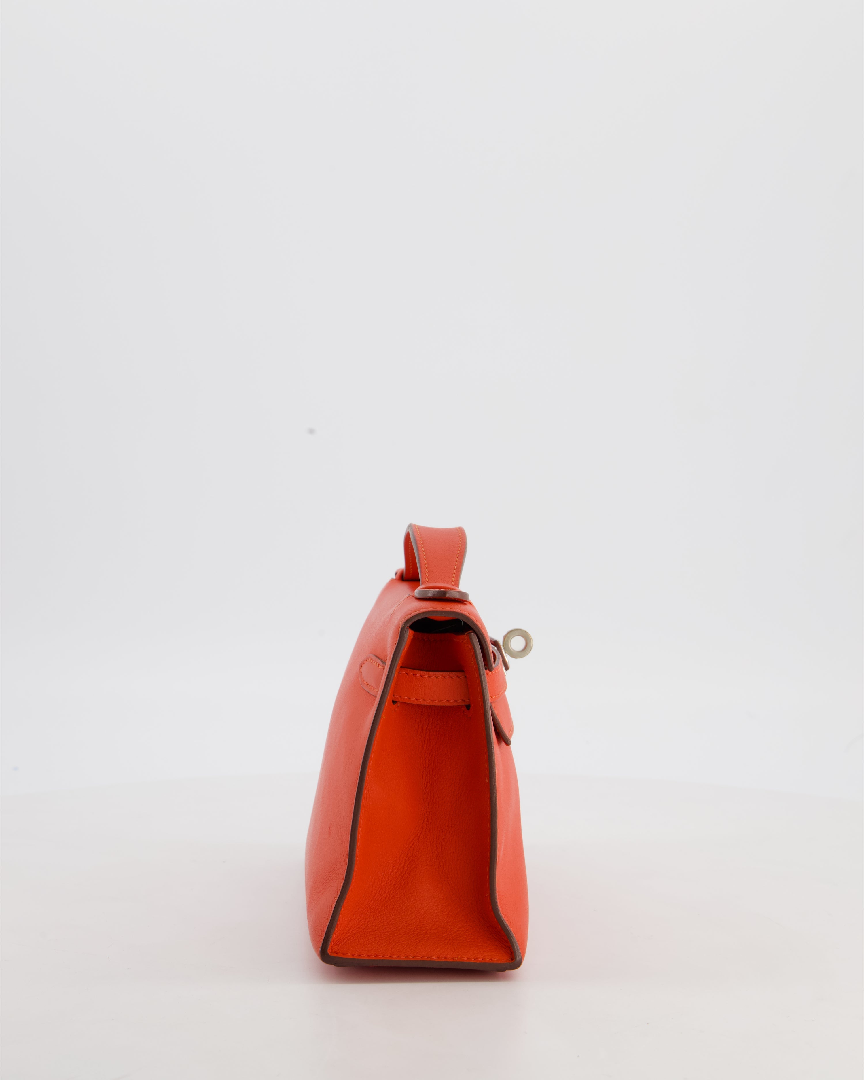 Hermès Kelly Pochette Bag in Capucine Swift Leather with Palladium Hardware