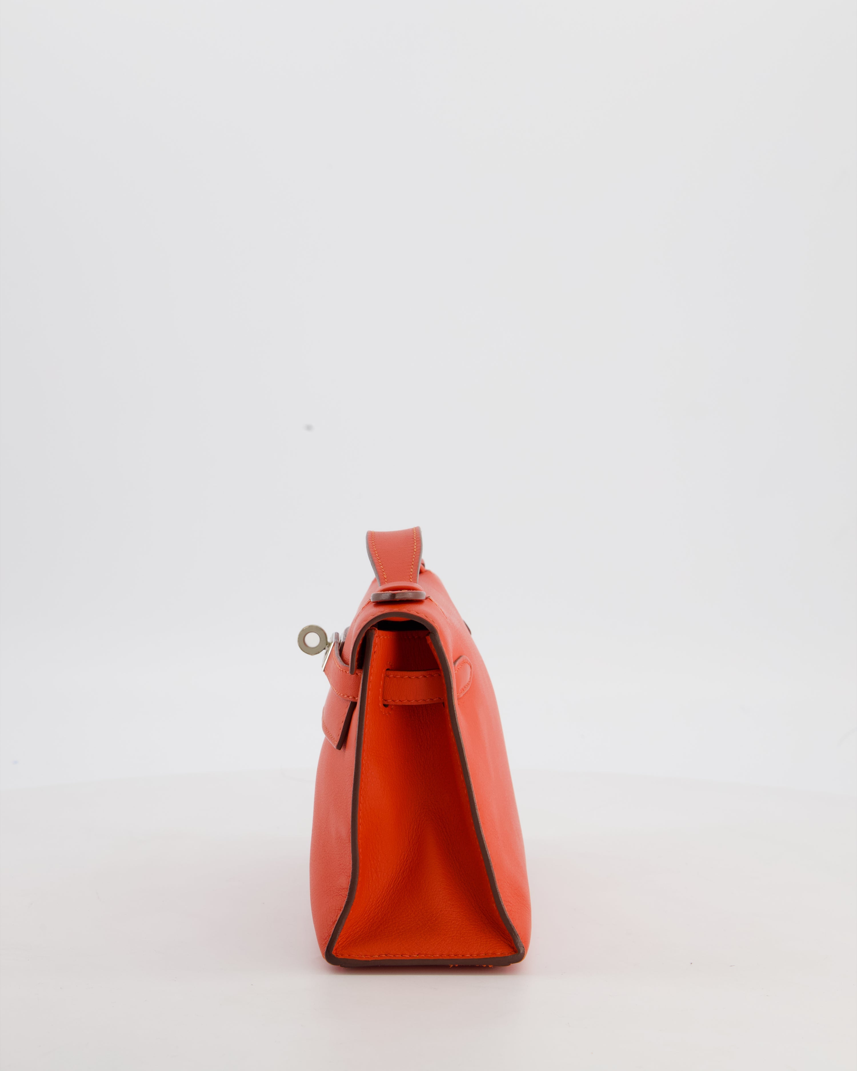Hermès Kelly Pochette Bag in Capucine Swift Leather with Palladium Hardware