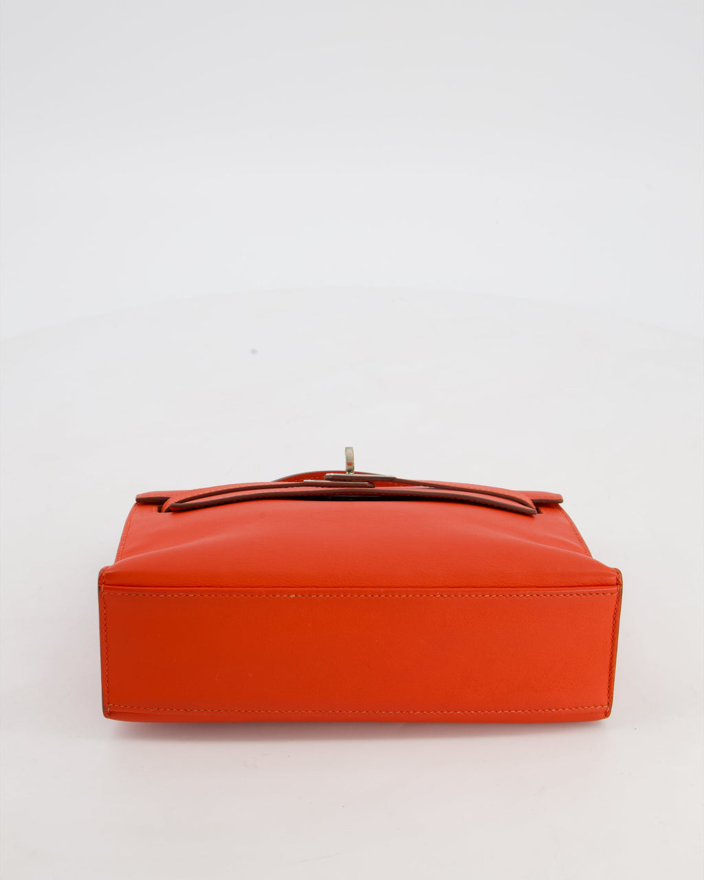 Hermès Kelly Pochette Bag in Capucine Swift Leather with Palladium Hardware