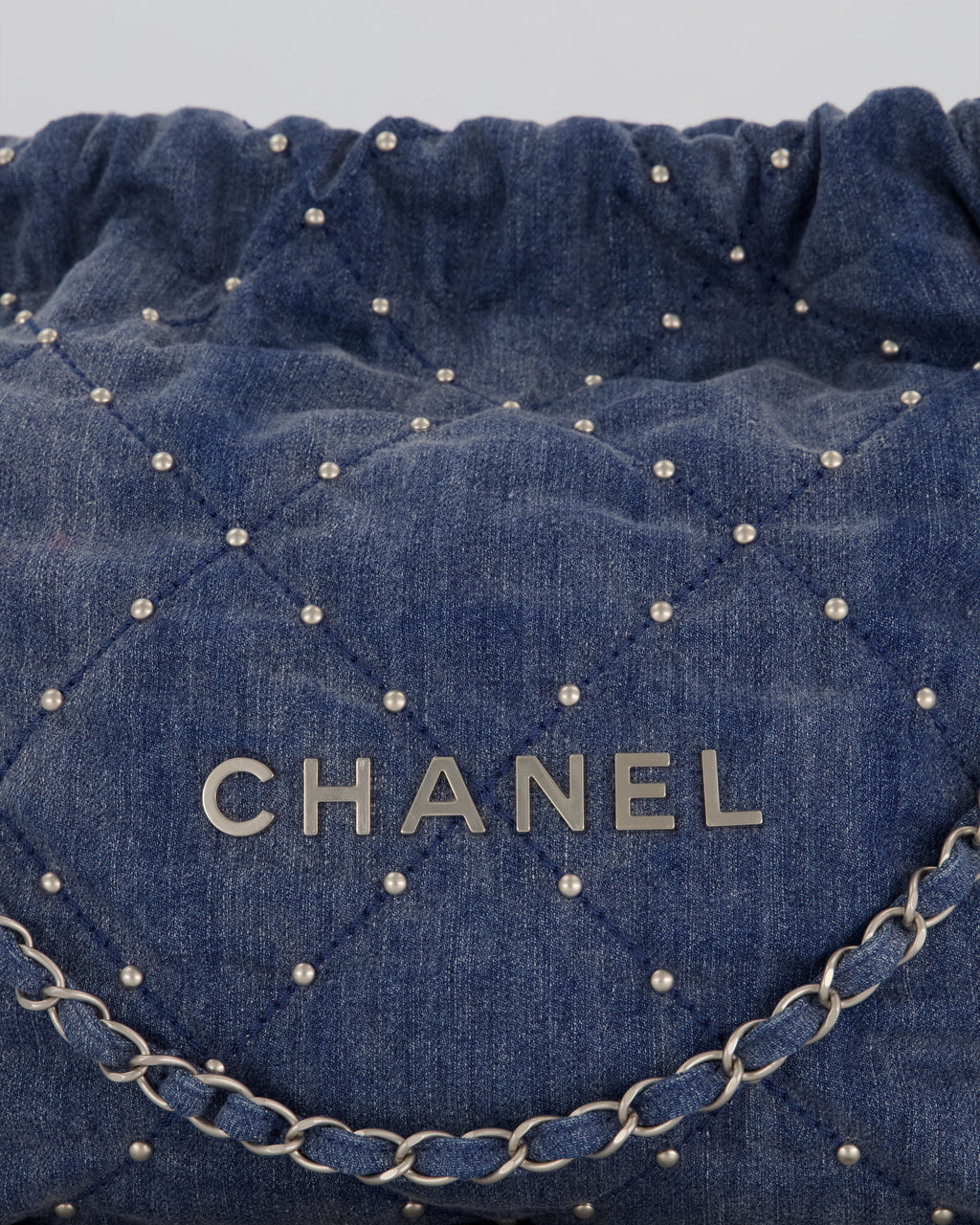 Chanel Small 22 Bag in Quilted Denim Fabric with Silver Studs and Brushed Silver Hardware
