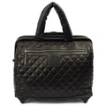 Chanel Wheeled Coco Cocoon in Black, Fabric