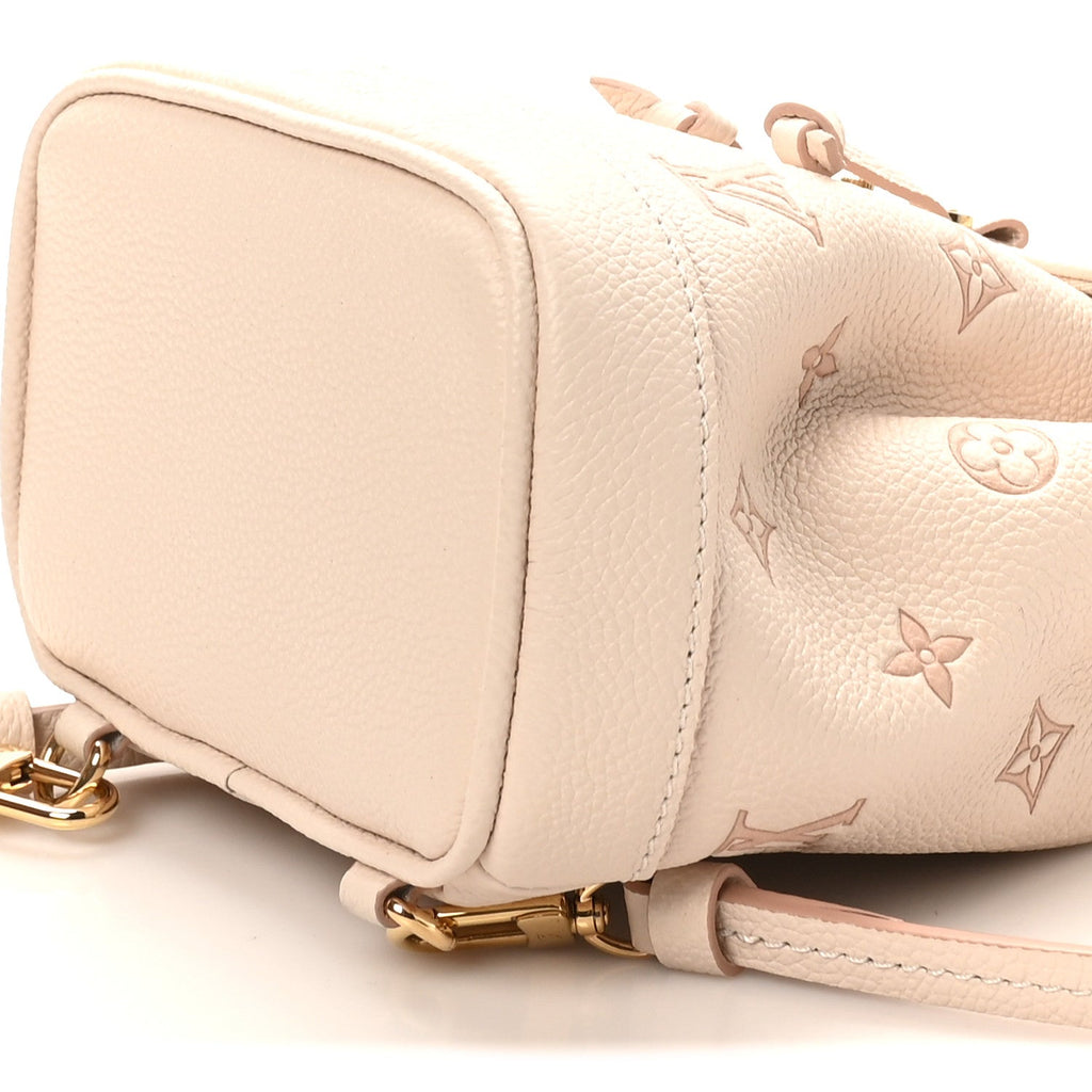 Empreinte Monogram Bicolor Nano Noe Backpack Eden