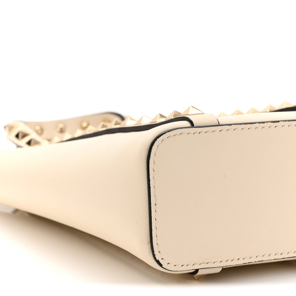 Pebbled Calfskin Rockstud North South Crossbody Bag Light Ivory
