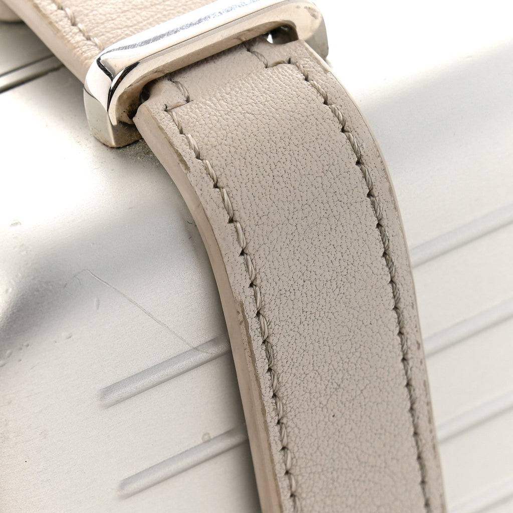X RIMOWA Aluminum Personal Clutch On Strap Silver