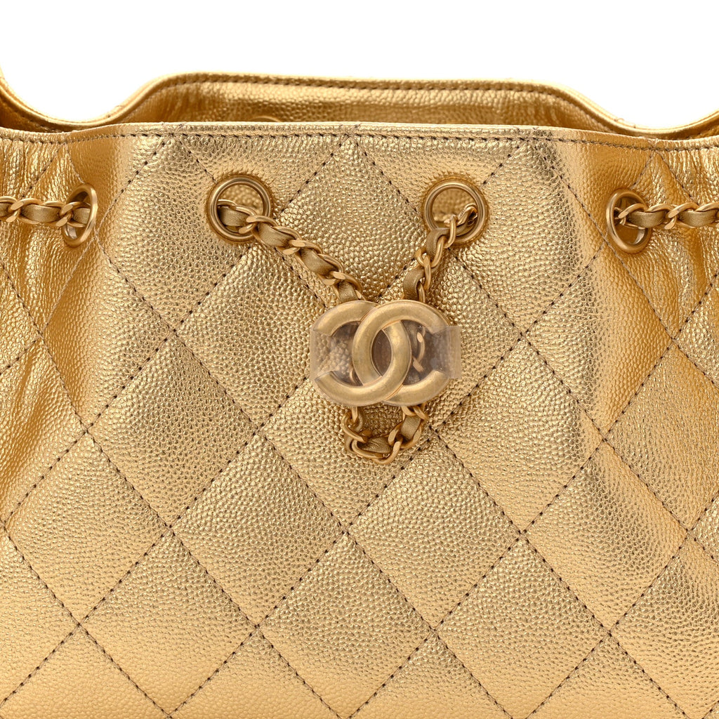 Metallic Caviar Quilted Mini Chanel 25 Handbag Gold