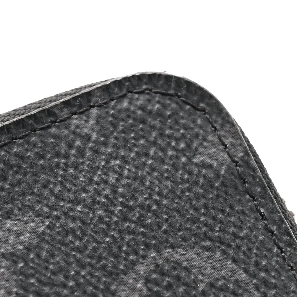 Monogram Eclipse Vertical Zippy Wallet