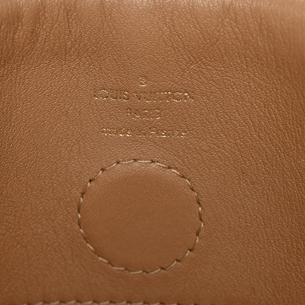 Monogram Tuileries Besace Sesame Peach Creme