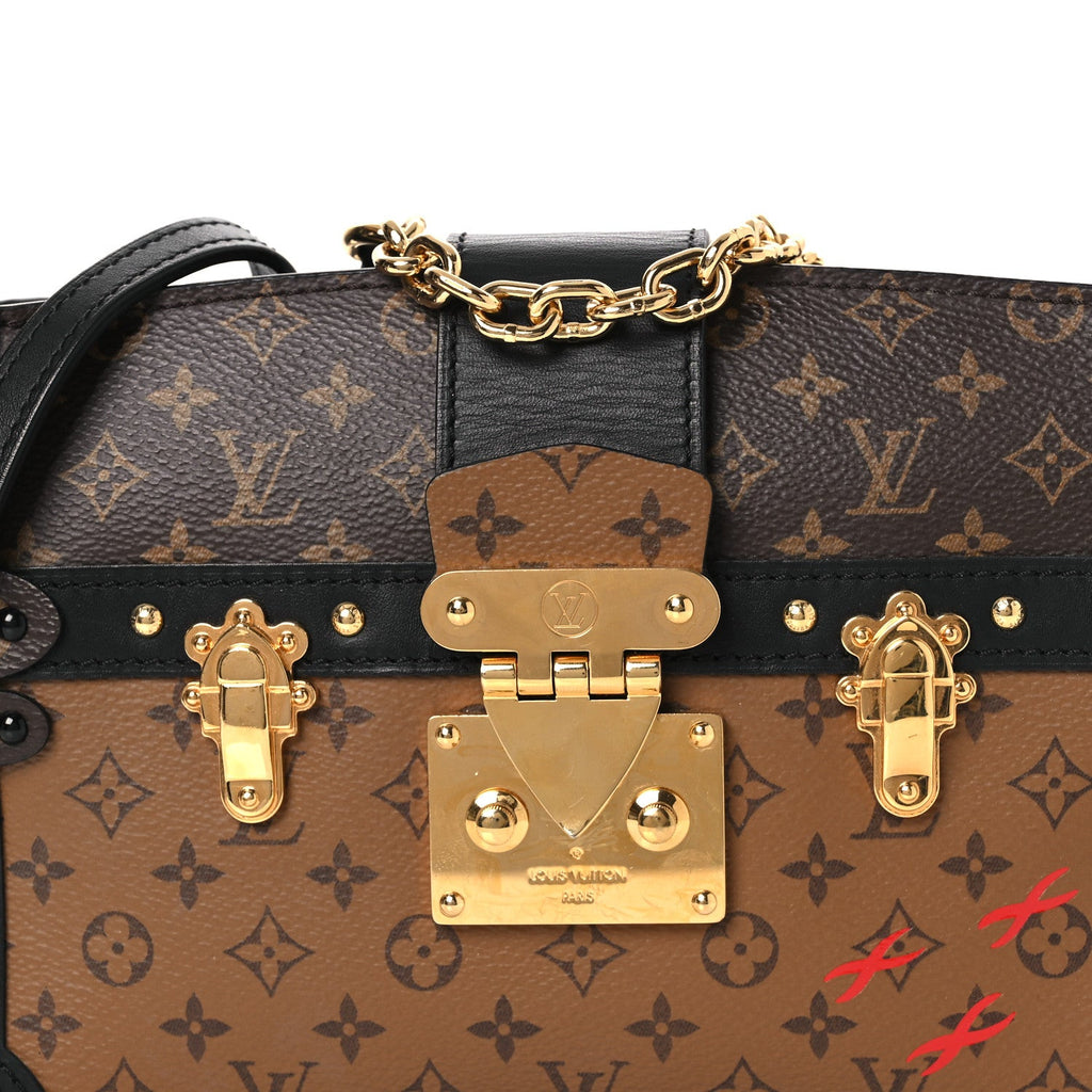 Reverse Monogram Trunk Clutch