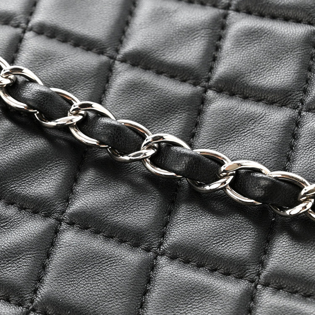 Lambskin Quilted Jumbo Chanel by 4 Flap Black