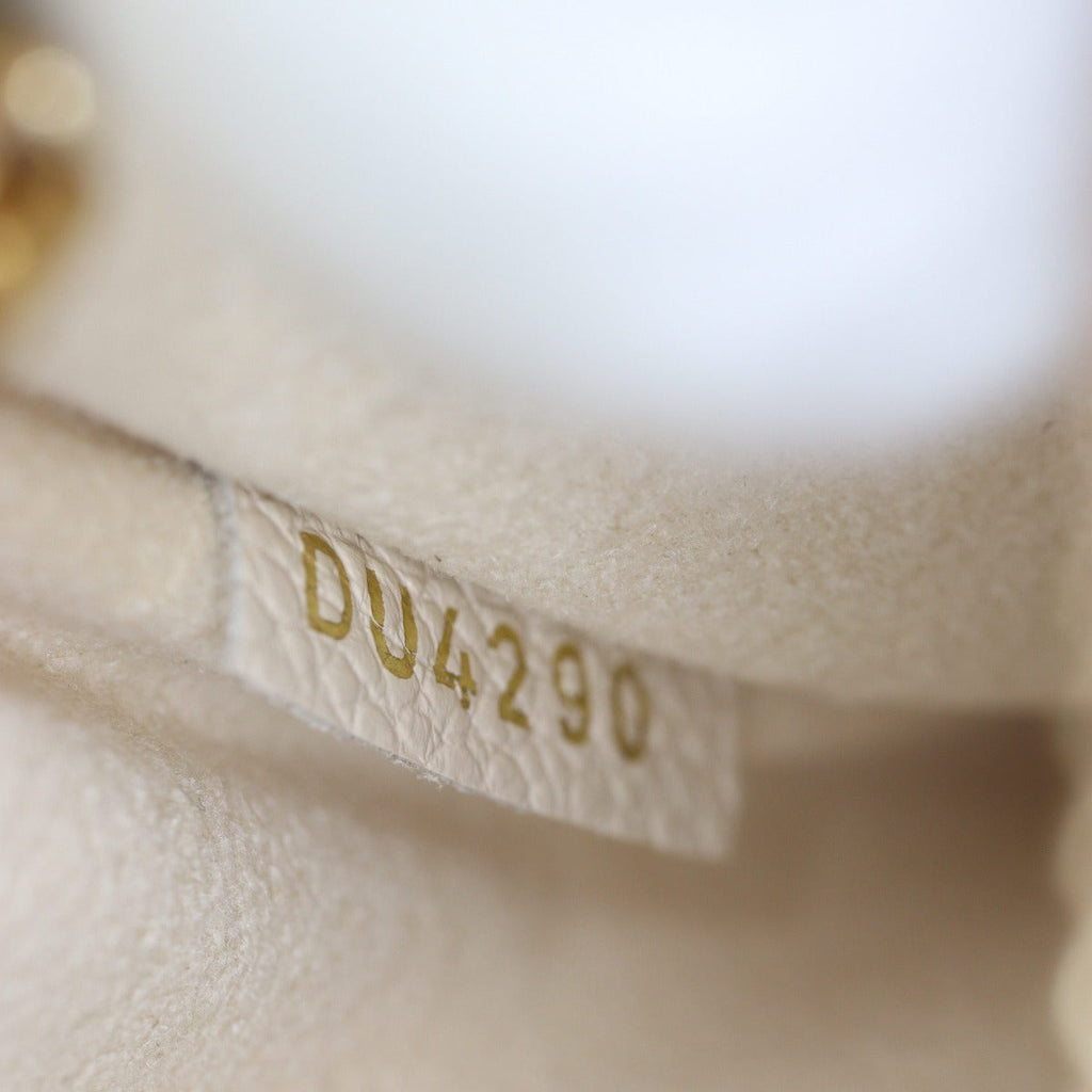 Louis Vuitton Pochette Metis Monogram Empreinte Bicolour