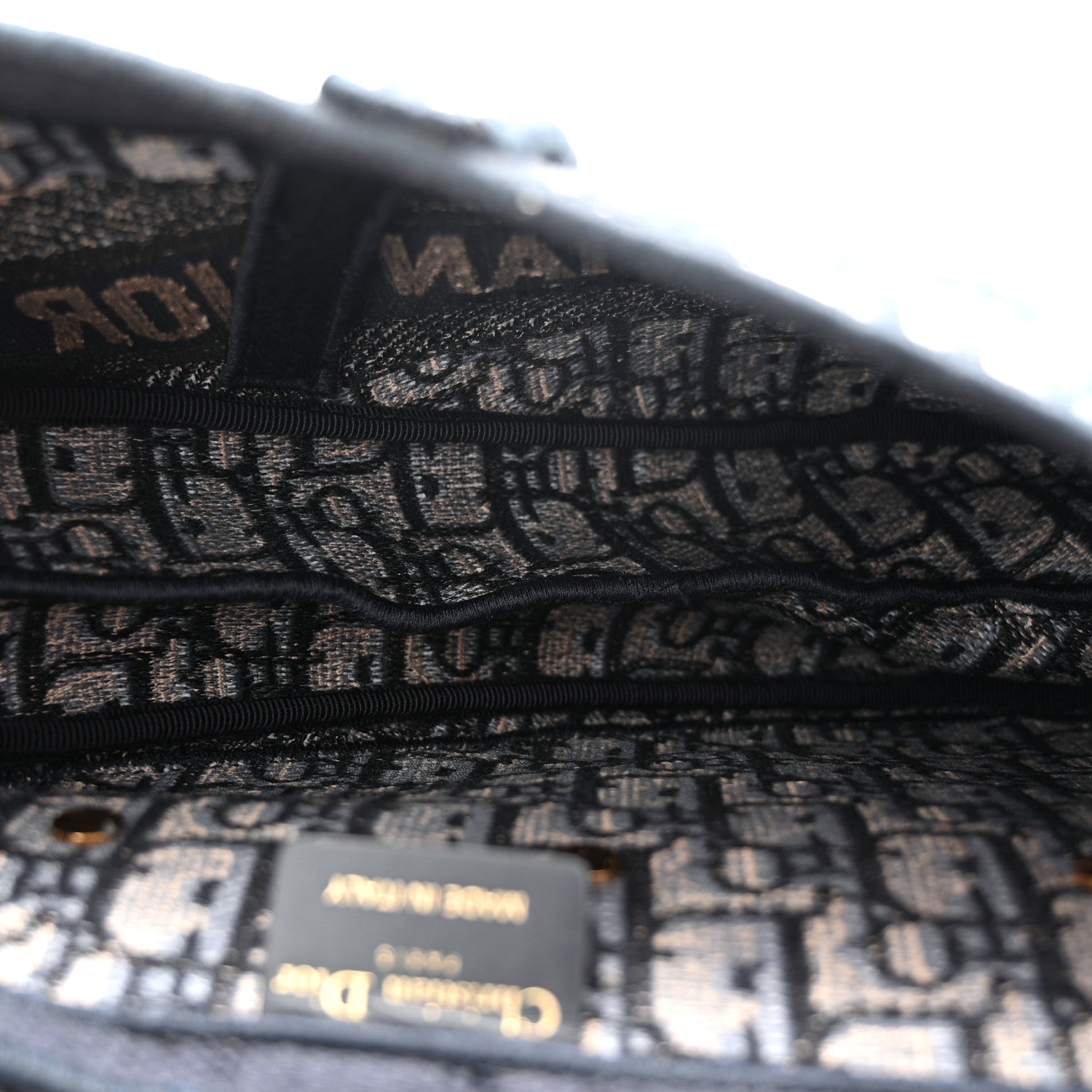 Oblique Embroidered Saddle Bag Blue