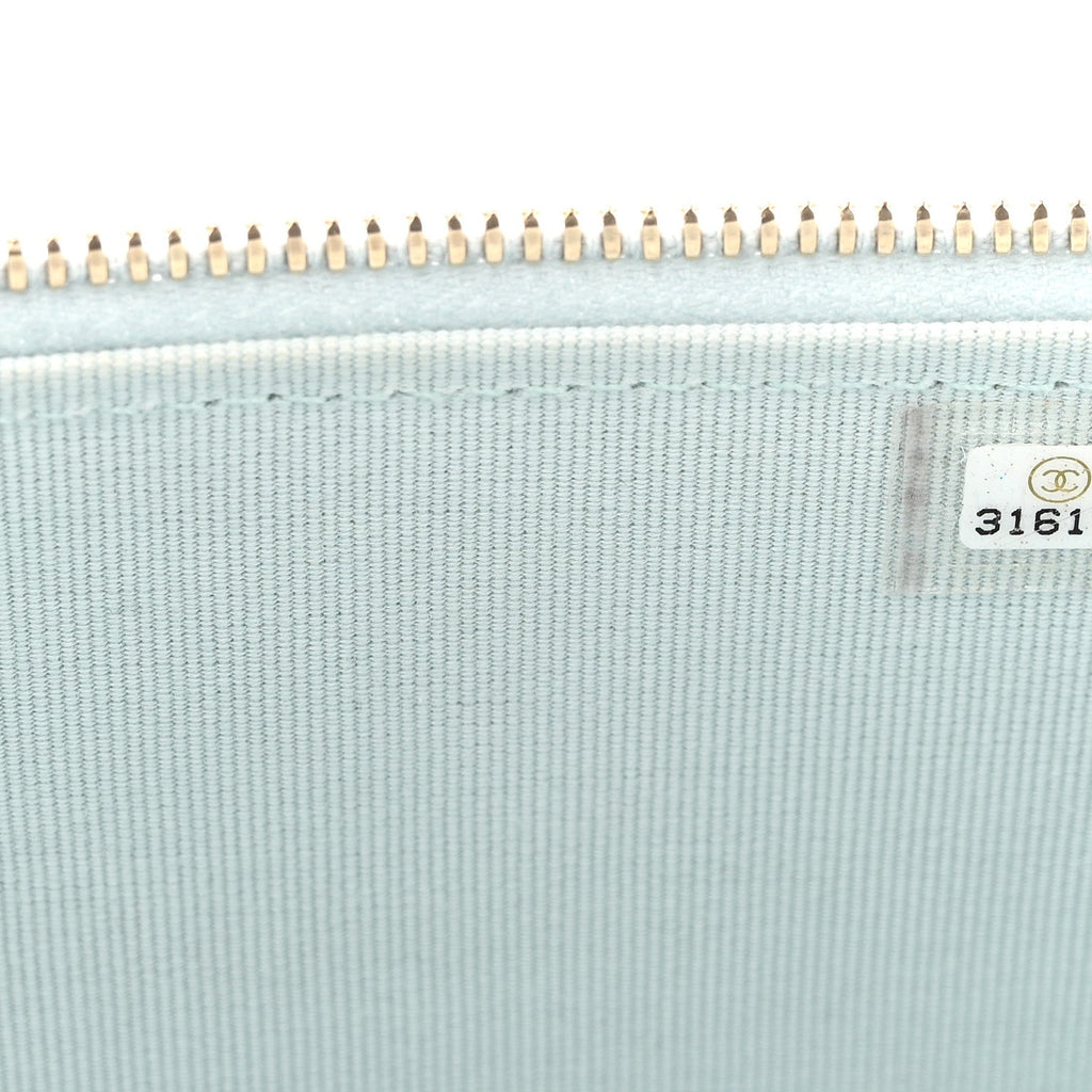 Lambskin Quilted Small Top Handle Vanity Case With Chain Light Blue