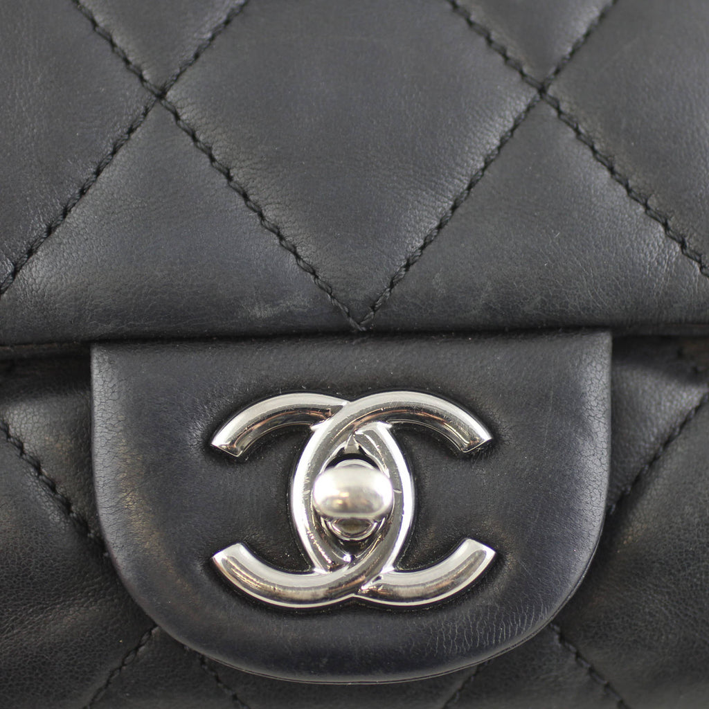 Chanel Soft Quilted Three-Pouch Flap Bag