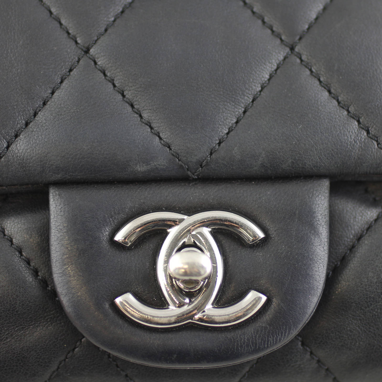 Chanel Soft Quilted Three-Pouch Flap Bag