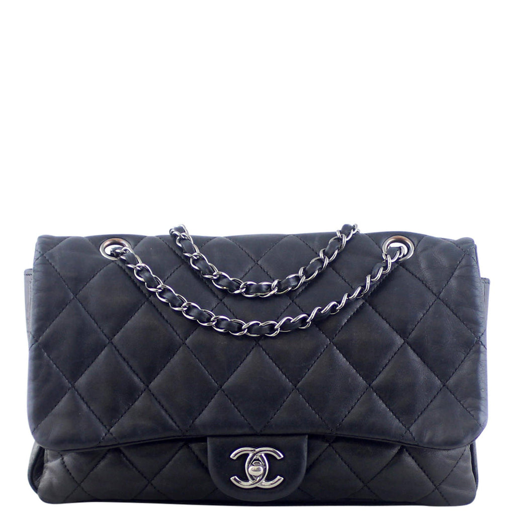 Chanel Soft Quilted Three-Pouch Flap Bag