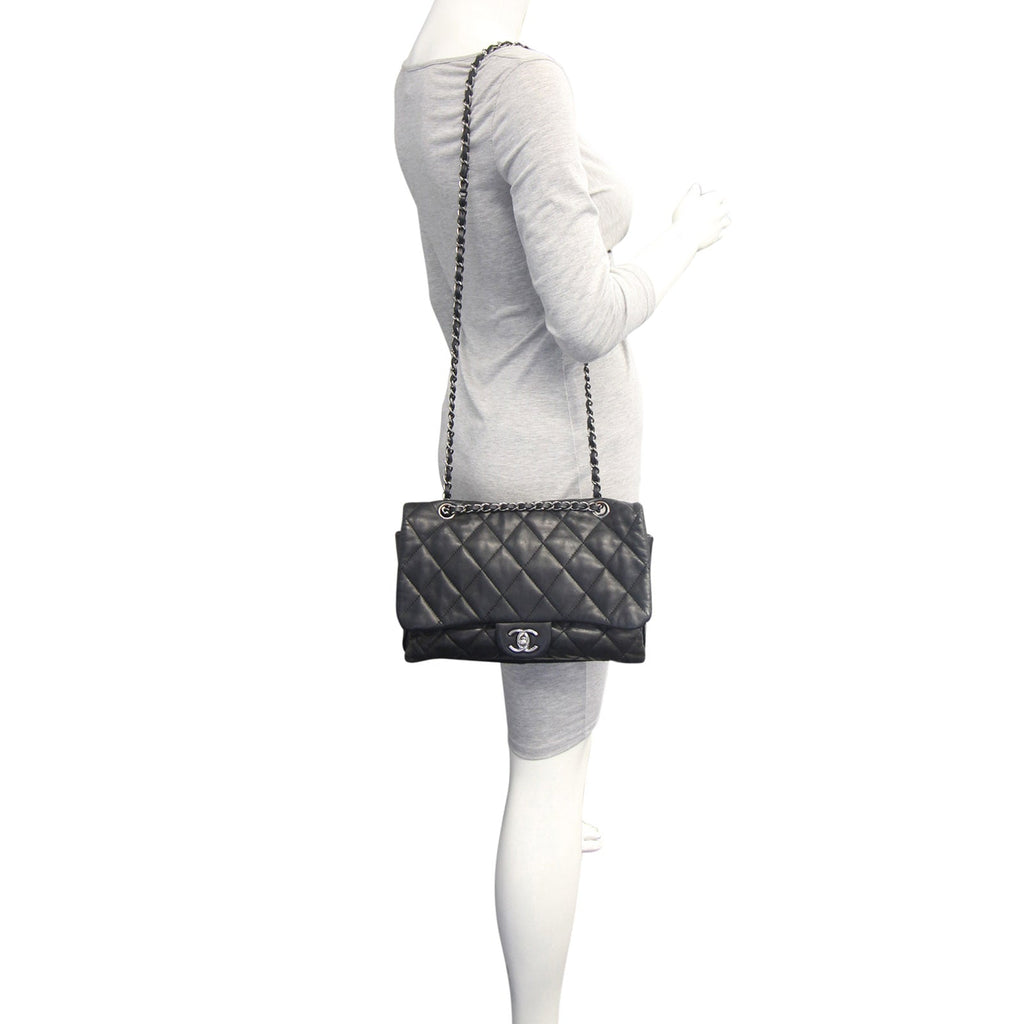 Chanel Soft Quilted Three-Pouch Flap Bag