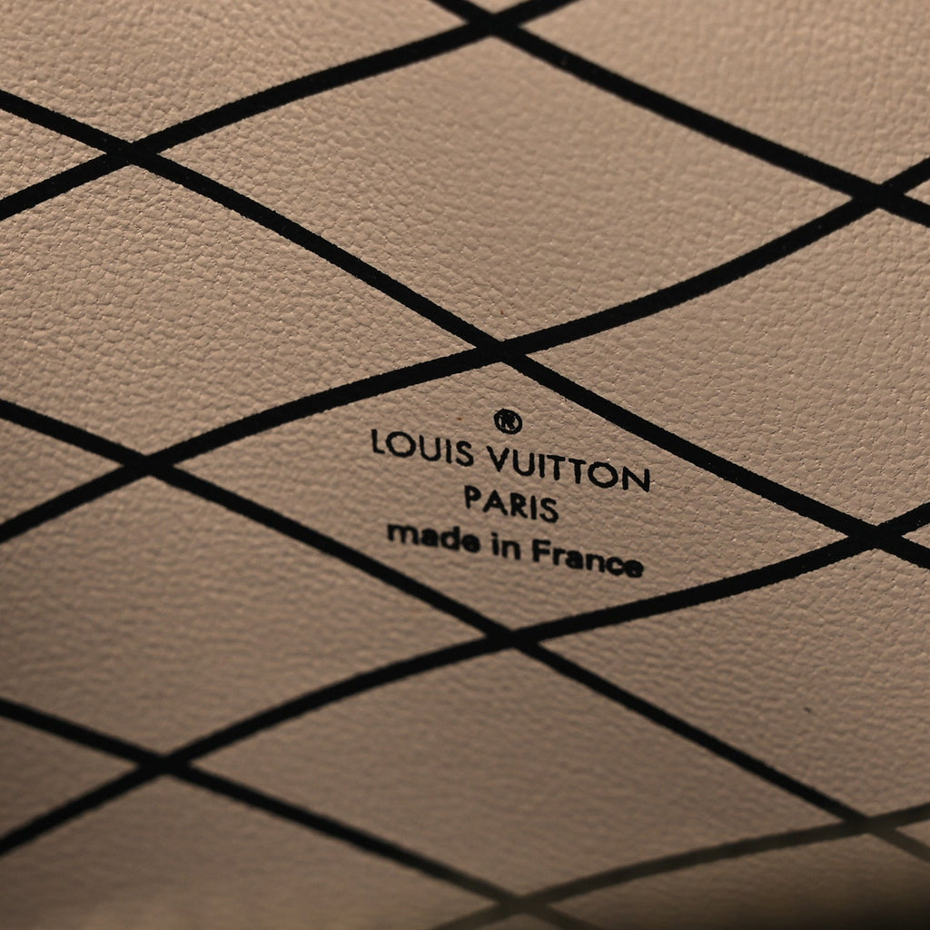 Reverse Monogram Trunk Clutch