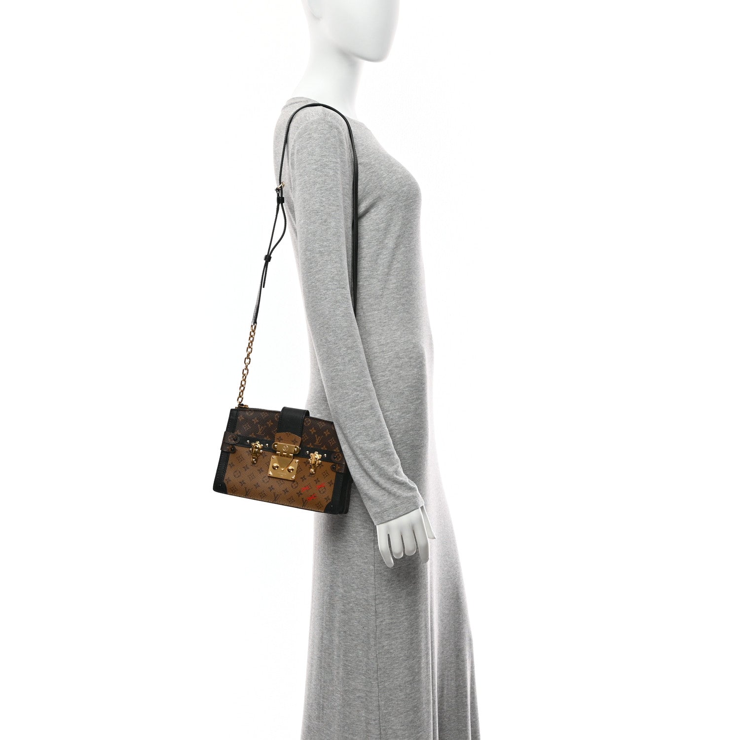 Reverse Monogram Trunk Clutch