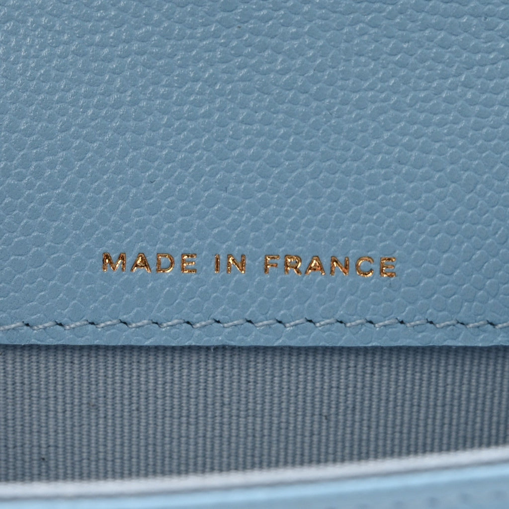 Caviar Quilted Flap  Holder Wallet Light Blue