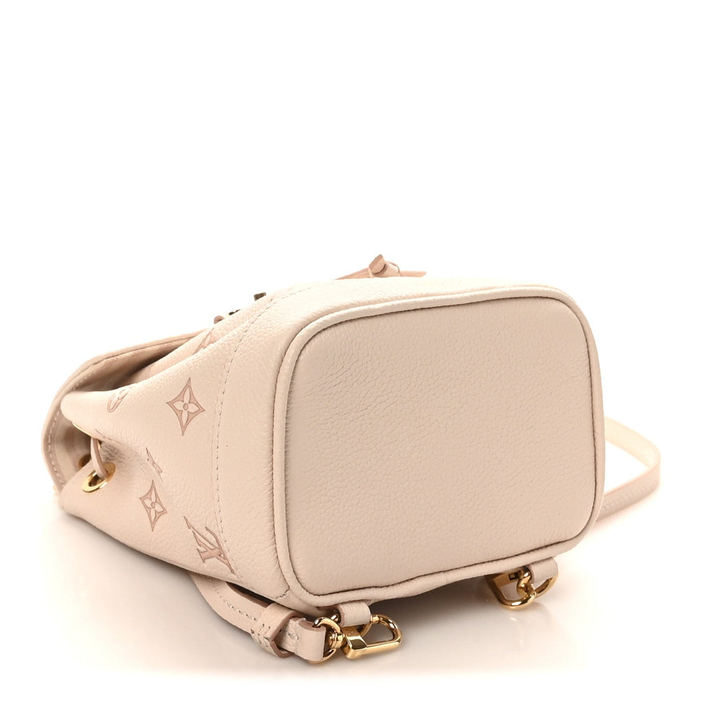 Empreinte Monogram Bicolor Nano Noe Backpack Eden