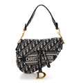 Oblique Embroidered Saddle Bag Blue