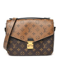Reverse Monogram Pochette Metis