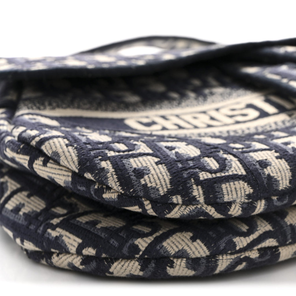Oblique Embroidered Saddle Bag Blue