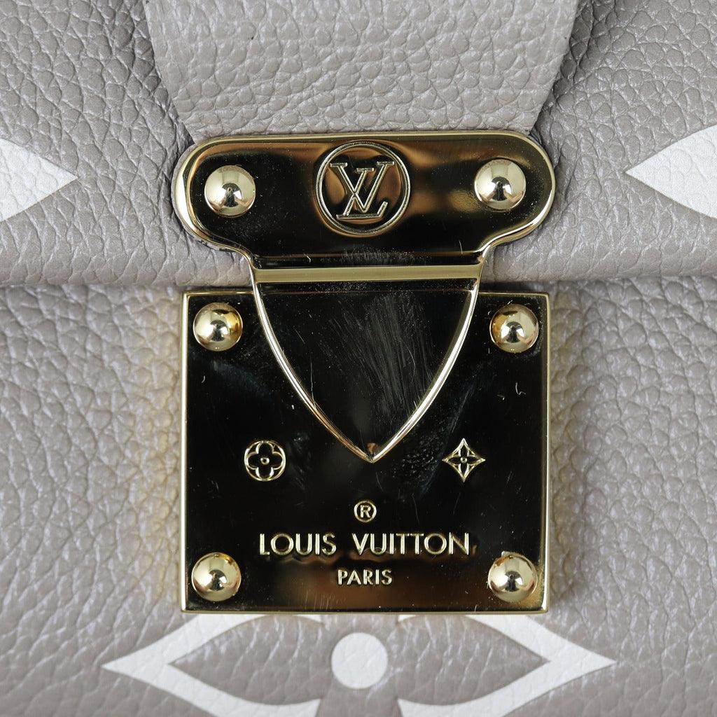 Louis Vuitton Favorite Monogram Empreinte Giant Bicolour