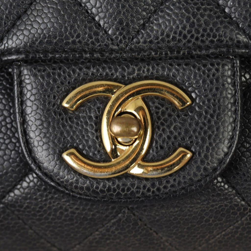 Chanel Classic Double Flap Maxi | Black Quilted Caviar