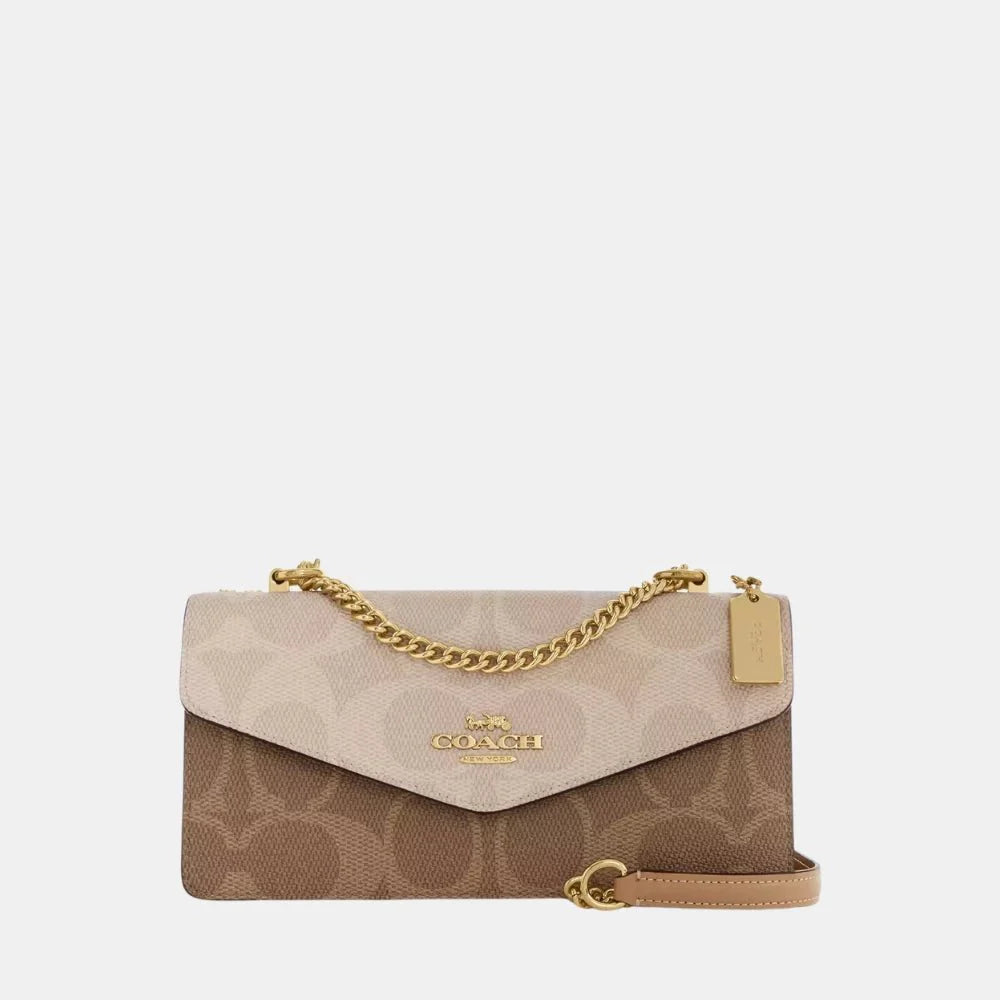 Coach Klare Envelope Crossbody Bag In Blocked Signature Canvas (Sand/Tan)